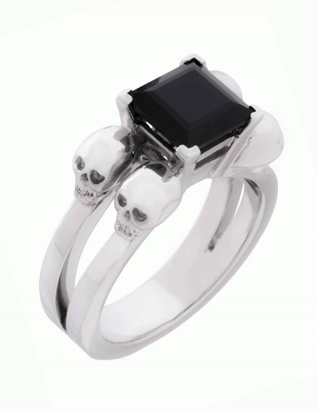 <span style="color: rgb(24, 22, 76); font-family: Inter; font-size: 14px; font-weight: 400;">Lethe is a women's skull ring made of silver. A black angular gemstone sits in the center.</span>Front view.            