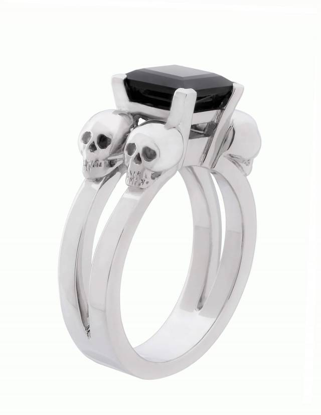 <span style="color: rgb(24, 22, 76); font-family: Inter; font-size: 14px; font-weight: 400;">Lethe is a women's skull ring made of silver. A black angular gemstone sits in the center.</span> Side view.            