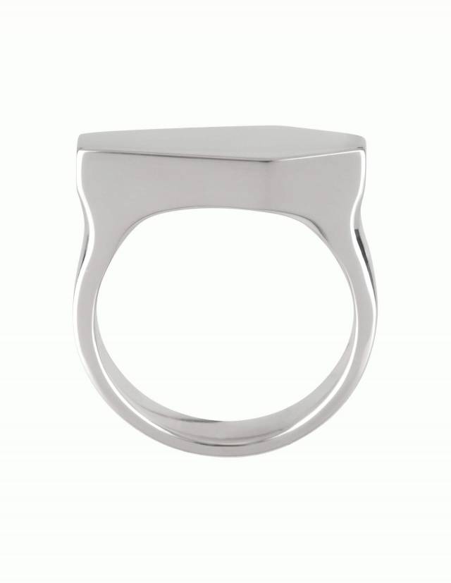 <div>Necromance is a large signet ring in the shape of a coffin. The surface of the ring made of 925 silver is smooth and shiny. The edges of the ring band are pleasantly rounded. The design is solid, simple, and elegant. <span style="color: rgb(24, 22, 76); font-size: 0.875rem; font-weight: 400; font-family: Inter;">Side view.</span></div>