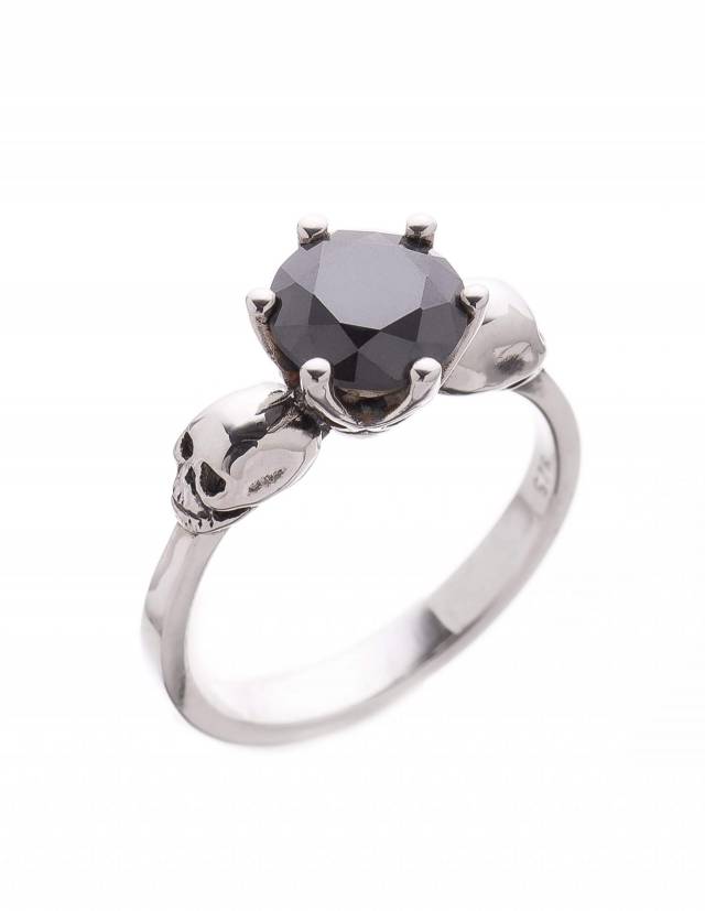A silver skull ring named Wanda with black moissanite gemstone.