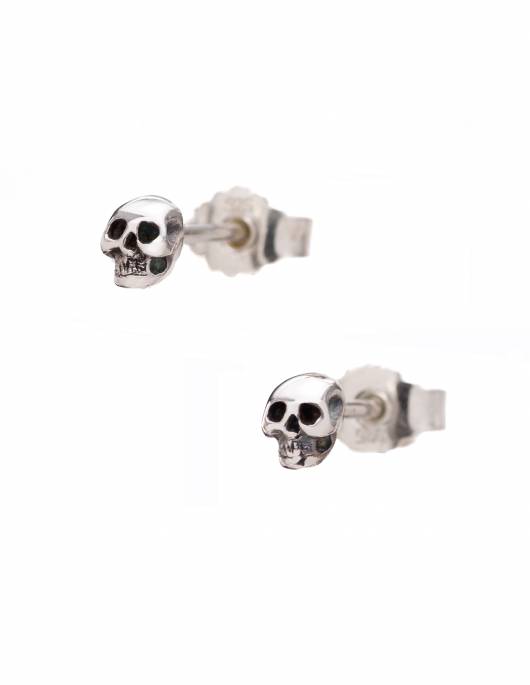 Small skull stud earrings in silver.