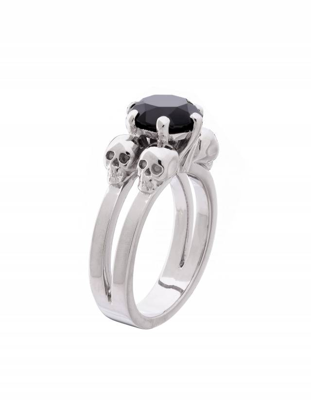 A skull engagement ring made of silver with a black gemstone, model: Lilith.